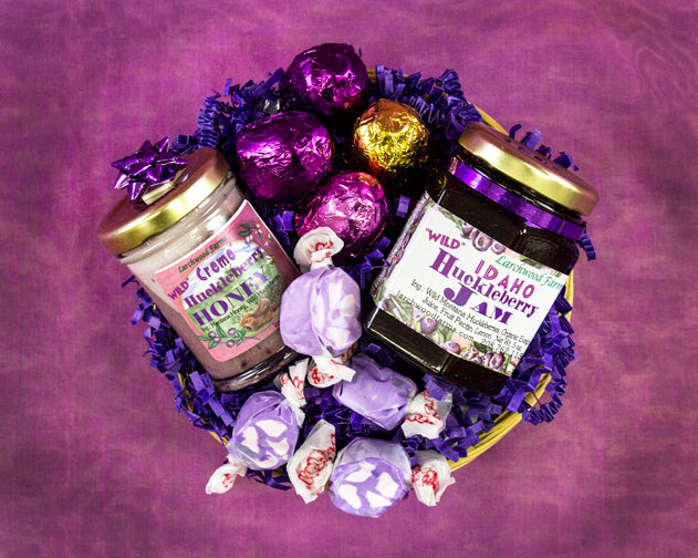 Give the gift of rich flavor in a hand crafted, beautifully arranged hucklberry gift basket.