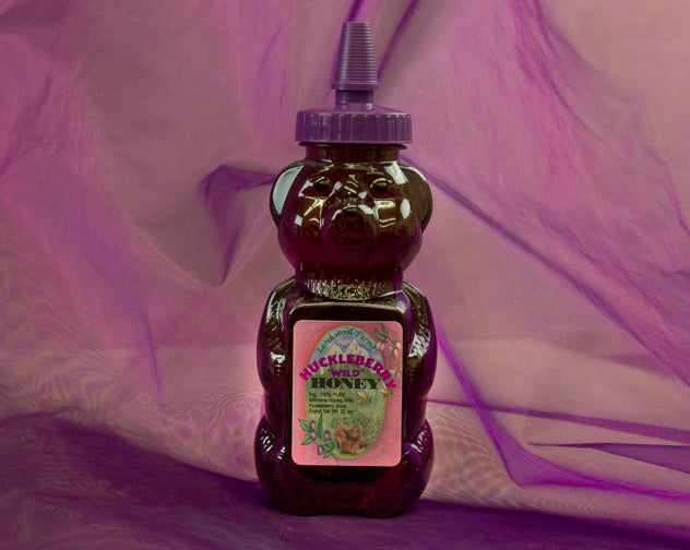 Montana bees and forest berries are honored by Larchwood Farms in this hand crafted huckleberry honey - 12 oz bear