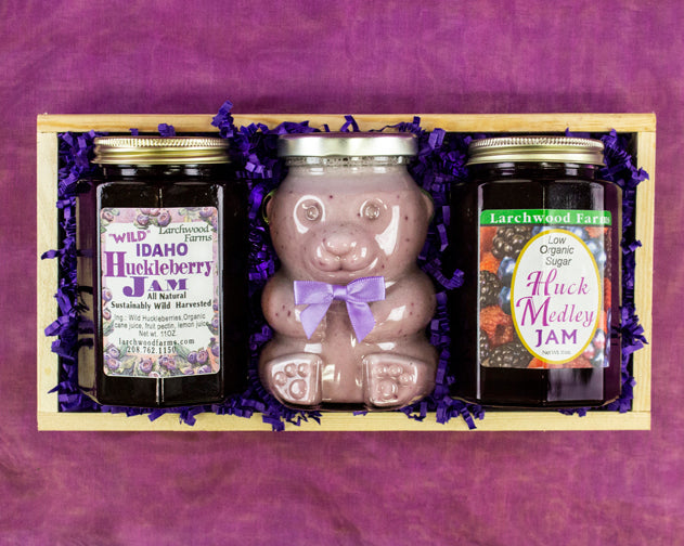 Hand crafted, all natural wild hucklberry bliss bottled and boxed in pine.