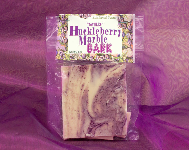 Elegant, divine marbled white huckleberry chocolate bark - an experience like no other!