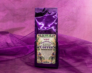 Simply divine huckleberry coffee crafted by Larchwood Farms, whole bean coffee tucked into a rich purple foil 7 ounce gift bag