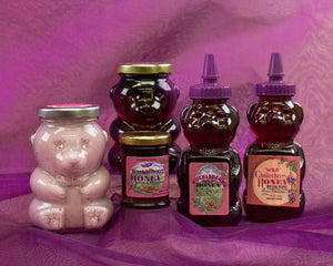 Montana bees and forest berries are honored by Larchwood Farms in this hand crafted huckleberry honey - 12 oz bear